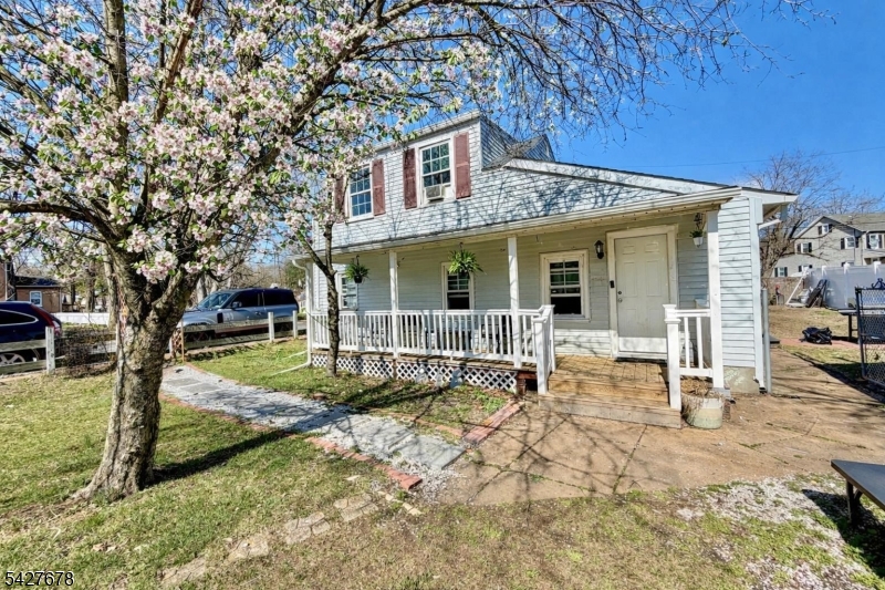 MOTIVATED SELLER!   Exceptional value in East Brunswick and priced for immediate sale. This 3-bedroom, 1-bath Cape Cod is being offered at a price point rarely seen in today's market for a one-family home in this location.  Situated in the desirable Old Bridge Village section, this home offers a flexible floor plan with a first-floor bedroom and full bath, plus 2 additional bedrooms upstairs. Features include a spacious front yard, private driveway, detached garage, charming front porch, a 1-year-old roof, and tankless water heater.Conveniently located near the New Brunswick Train Station, shopping, restaurants, and schools. Home needs updates, the price reflects its condition and presents an outstanding opportunity for homeowners, investors, or buyers looking to build equity. Being sold strictly as-is.Don't miss this opportunity?