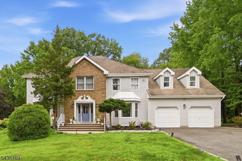 **Recent updates include freshly painted front exterior, garage doors, front entry, railings, and trim, along with refreshed foyer and fireplace accent walls in a modern gray. The paver walkway has been professionally power washed and re-sanded, and all front-facing windows painted and sealed making this home truly move-in ready**Perched on the highest point of the prestigious Tingley Estate, this stunning fully renovated 6-bedroom Colonial offers an elevated lifestyle. Step into a grand foyer with an open and spacious layout, featuring hardwood floors throughout, a large eat-in kitchen with new countertops and appliances, and an expansive family room centered around a beautiful gas brick fireplace. The first floor includes a fully updated bath, oversized walk-in closet, and convenient laundry room   with an additional second-floor laundry for ultimate ease. Upstairs, enjoy generously sized bedrooms with walk-in closets, offering plenty of space and comfort. The finished basement adds even more living and entertaining space with brand-new flooring and a stylish bar area. Designed with modern convenience in mind, this smart home features smart lighting and smart toilets throughout. Step outside to your private backyard retreat featuring a huge deck, a beautiful enclosed gazebo, and a fully functional fountain and pond creating the perfect setting for entertaining or peaceful relaxation.