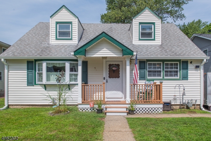 The Charm of an expanded Cape in the heart of DWTN Denville. This 2294 home has a comfortable, spacious floor plan. Many Appealing Features Throughout.  Great 1st floor layout including 2 bdrms & 1 full bath. Beautifully updated Kitchen features 2 toned cabinets & clay mosaic style backsplash. HW Floors throughout. Formal LR/DR Bookend the Stunning EiK. Sliders from Bonus FR Open to an Oversized Back Deck & fenced in yard. Perfect for entertaining. Large Master + an addtl bdrm & Full Bath on 2nd level. Ton of upgrades- newer water heater, furnace, gas appliances, windows & flooring throughout. Hardwired Security System. Great Value! Plenty of parking. Walk to bustling dwtn. Enjoy Denville's shopping, restaurants & top-rated schools. Nearby commuter locations, NYC direct trains, bus, hwys. 3 zone heating.