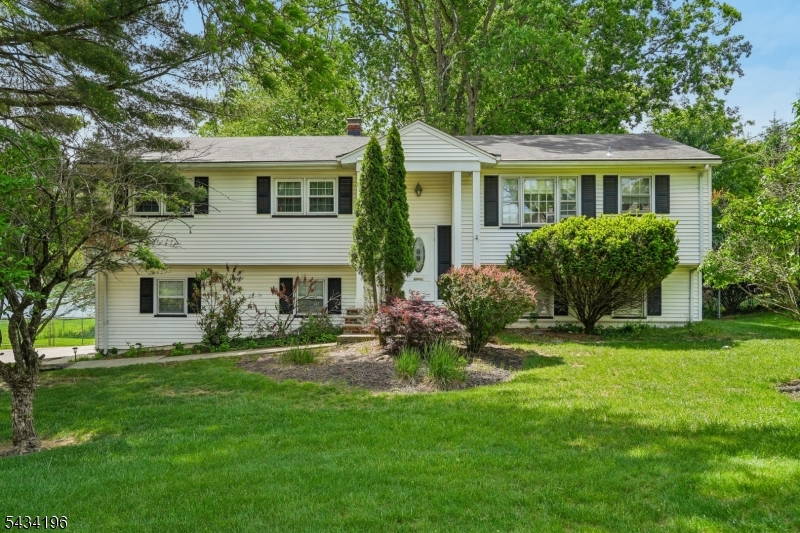 Great Bi-level home offering a spacious and functional layout. The main level features a bright Living Room, Formal Dining Room, Eat-in Kitchen, Master Bedroom with Master Bath, two additional Bedrooms, and an additional full Bathroom. The ground level offers a Family Room with sliders leading to a spacious private fenced yard, a fourth Bedroom, Powder Room, Laundry Room, and access to the attached 2-car garage. Home includes a whole-house generator for added comfort and peace of mind. Conveniently located close to schools (walking distance to elementary school), shopping, dining, and transportation. All Highest and Best Offers Due Wed. 6/3 5pm.