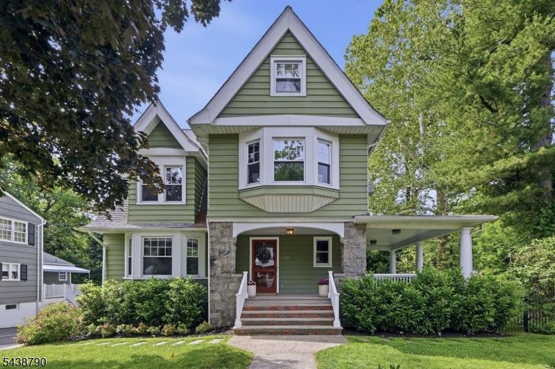 Just blocks from downtown Summit and the Midtown Direct train, this Victorian seamlessly blends architectural character with refined modern updates. Outside, the wrap-around porch invites effortless indoor-outdoor living, from dinners al fresco to afternoons with a book, while the flat, fenced backyard with gated access, mature landscaping, and a circular driveway off High Street creates a private, idyllic setting for play, pets, and hosting. Inside, the main level preserves its historic soul through a welcoming foyer, high ceilings, custom millwork, rich wood floors, and stained-glass details. The flow is ideal for gatherings, with two sun-filled living rooms with fireplaces, a formal dining room, a refreshed powder room, and a beautifully renovated eat-in kitchen with island seating and a back staircase. The second level is brilliantly laid out with a spacious primary suite with a grand dressing room and updated bath, plus three additional bedrooms and a flexible office/playroom. The third floor is a private enclave with two more bedrooms, a bright office, and a full bath, ideal for guests. The finished lower level maximizes every square inch with a media room with Sonos surround sound, dedicated gym with radiant-heated floors, wet bar, full bath, and laundry room. Combining timeless character, smart updates, and an in-town location near shops, restaurants, parks, schools, and direct Manhattan commute, this home is move-in ready for its next chapter.