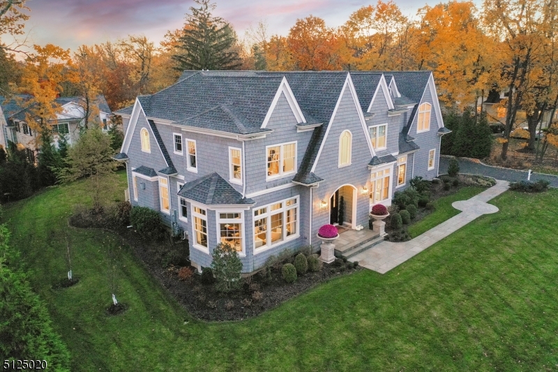 ENTERED FOR COMP PURPOSES ONLY. Absolutely breathtaking custom-designed newer construction home in the heart of Old Short Hills. Light-filled and with handsome hardwood floors throughout. Gorgeous modern gourmet kitchen with large quartz center island, walk-in pantry, high-end appliances, and sun-lit breakfast area open to a fireside family room. The first floor also features a stunning foyer, gorgeous dining room, a butlers pantry with a full-size wine refrigerator, two private offices, a large mudroom, and a first-floor guest suite. Seven en-suite bedrooms, including a luxurious primary suite with a designer dressing room, private balcony, walk-in closet, and a stunning bathroom with a soaking tub. The lower level includes a guest suite, complete home theatre, recreation room, full gym, and an indoor basketball court with 18' ceilings. 3-car garage, built-in whole house generator, and beautifully manicured grounds.