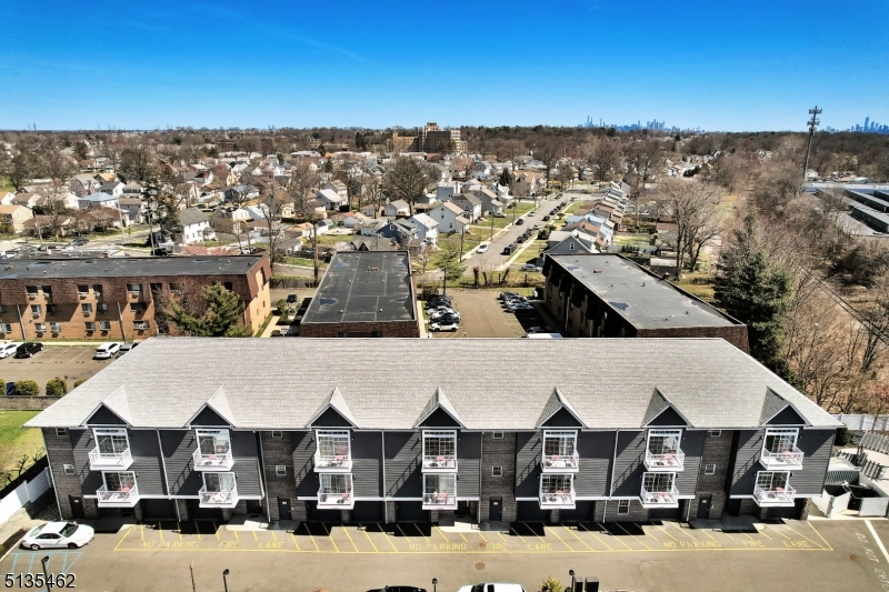 Investors - Stunning 18 unit luxury apartment building, constructed in 2016.  This meticulously designed property features 17 spacious 2 bedroom/2 bath units with open floor plans.   The first-floor units come with attached garages with unit access, private patios.   The seven second floor units each 1,100 sq ft, offer open concept layouts with balconies.  The seven third floor units feature expansive 1,500 st. ft. floor plans with lofts and private balconies.  All units offer hardwood floor, w/d in unit, SS appliances including dishwasher/microwave and central air. Close proximity to major highways, downtown Montlclair, train.   Separate utilities, 2 parking spots available for each unit.