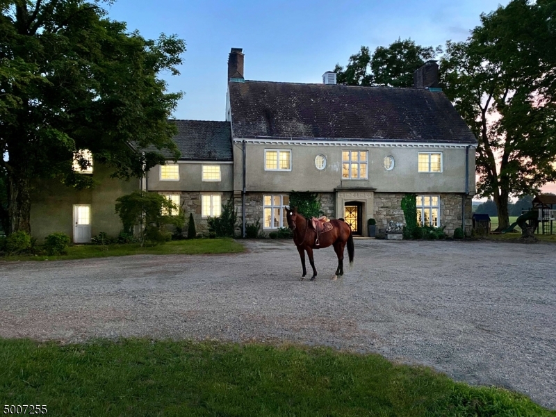 "Oldacre", an unmatched estate property on 88+/-AC with long pastoral views, pond, plentiful pasture land & gently rolling lawns. The English-style residence offers sophisticated living on 3 levels. This one-of-a-kind estate comprises approximately 88 acres of versatile land.  It would make a remarkable equestrian estate, country retreat or full-time residence.  The stylish Kitchen was designed for cooking and entertaining.  Panoramic views to the west are framed by French doors.  Period features include raised-panel wainscoting, an elegant curved staircase, arched doors and architectural moldings. Natural light floods the rooms. Recent  improvements include central air conditioning, forced warm air heat, and heat pumps.  The pool has been refurbished and offers the perfect place for outdoor recreation.