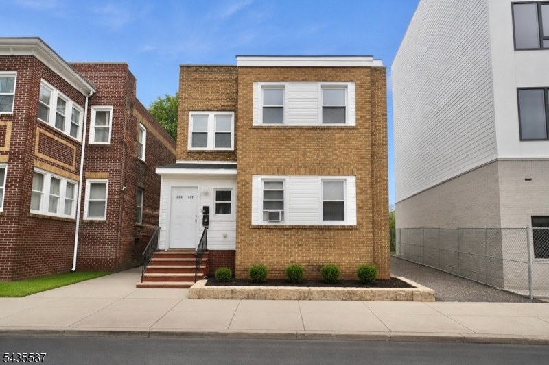 Charming fully renovated two-family home in Newark featuring hardwood floors, central heat/AC, and modern kitchens and baths. Each unit offers 3 bedrooms and 1 bath. Includes a 1-car driveway and backyard. Conveniently located near schools, shopping, transportation, and major highways. Ideal for investors or owner-occupants seeking strong income potential.