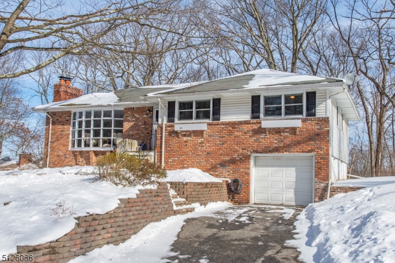 Move right in! This beautiful 3 bedroom ranch showcases an updated kitchen with stainless steel appliances and granite countertops. Generously sized deck and backyard with fire pit make entertaining easy and enjoyable! Home also boasts hardwood floors throughout, large bay window, recessed lighting, 1 car garage, newer Pella windows in bedrooms and plenty more! Excellent location in town very close to shopping/town center and plenty of state parks, hiking trails and lakes! Chimney/fireplace as-is with no known issues.