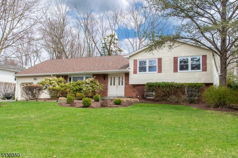 This is the one you have been waiting for, Custom, expanded Split in sought after neighborhood, 5 Bedrms, 3 1/2,Baths, situated on wooded, fenced in property surrounding pool and patio. Large entry leads to open floor plan with great flow for entertaining. Expansive Dining room, Living w/ FPL open to media room with bar. Updated Kitchen, center island, granite counters, pantry, skylight over breakfast area overlooking yard.  Powder room and Laundry complete the 1st level.  2nd Level has 4 Bedrooms , Expanded Primary Bedroom and Sitting room open to a deck with Hot Tub and stairs leading to pool. 2 Walk in closets, plus 2 custom organized closets with drawers.  The Luxury Primary Bath  has a dressing area, whirlpool tub ,shower and double vanity.  3 additional bedrooms, full updated bath and stairs to the walk-in attic for Maximum storage. The Lower Level Family Room is huge and has door to outside to access the pool. In addition there is a bedroom and full bath, ideal for  M/D. The beautiful backyard is private with concrete, heated pool and large patio for summer fun. Hardwood floors throughout , Generator, New Roof, are just some of the many amenities...Great location, walk to the HS  and Library, minutes to  RT 80 and 287..Take advantage of all Montville has to offer.HIGHEST AND BEST TUESDAY 4/12 , 5 PM...