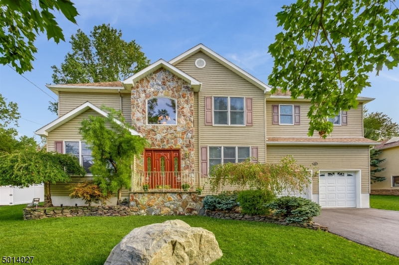 Spectacular 5 bedroom, 3 1/2 bath colonial home in the highly desirable Whippany section of Hanover Township. The home features a 1st floor bedroom (currently being used as family room) & full bath. Formal LR, DR to beautiful Kitchen boasting granite, center island & s/s appliances. The sun filled FR boasts vaulted ceilings, wall of windows & fireplace. Master bedroom features walk in closet and ensuite master bathroom w/ jetted  tub & custom tiled shower. 3 additional large Bedrooms and Hall Bath upstairs. HW throughout the house.  First floor Laundry Room.Township has a beautiful town pool (additional fee), community center, before/after school programs. Low property taxes & excellent schools. Easy access into downtown Morristown &  Convent Station NYC Midtown Direct Train