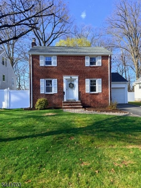 Welcome home to this charming and updated 3 bedroom, 2.5 bath Colonial nestled on a quiet, tree lined street in desirable Roseland. Offering a flexible layout, numerous recent improvements, and the convenience of top rated schools, low taxes, and an excellent location, this home is ready for its next owner to move right in and enjoy.The freshly painted interior features newly refinished hardwood floors, a wood burning fireplace, French doors, a cedar closet, and abundant natural light throughout. The updated kitchen boasts new appliances and flows seamlessly into the main living areas, making everyday living and entertaining a breeze.The flexible floor plan features a spacious first floor primary bedroom, offering the convenience of one floor living. Upstairs, you'll find two generously sized bedrooms, a full bath, and a convenient adjoining half bath.Major updates include newly refinished hardwood floors, a new roof, new fence, updated windows, new kitchen appliances, and a newly finished basement with brand new basement windows. Step outside to a private backyard with a deck and storage shed, perfect for relaxing, entertaining, or gardening.Situated close to shopping, dining, parks, and major commuter routes. Additional features include central air conditioning on the first floor. Combining classic Colonial charm with today's sought after updates and conveniences, this home presents a wonderful opportunity in one of Roseland's most desirable neighborhoods.