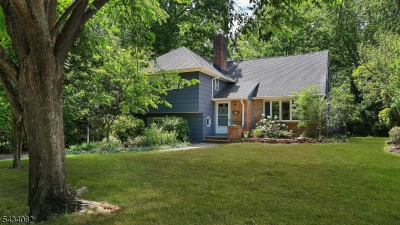 Located on one of Westfield's most iconic wide, tree-lined streets, this five-bedroom home with two full and two half baths offers the perfect blend of charm, space, and flexibility just moments from downtown and the commuter train to New York City.From the moment you step inside, you'll feel the home's inviting warmth, natural flow, and spacious layout designed for both everyday living and entertaining. Flexible living spaces throughout easily adapt to changing needs, whether you're hosting guests, working from home, or simply looking for room to grow.The showpiece of the main level is a spectacular family room addition   an expansive space wrapped in walls of windows and skylights that flood the room with natural light throughout the day. Bright yet comfortable, it's equally suited for cozy nights in or lively gatherings with company.The thoughtful layout offers incredible versatility, with three bedrooms on the second floor, a private third-floor primary retreat, and an additional ground-floor bedroom or office that can evolve with your lifestyle. A full-size basement with impressive ceiling height is ready for your vision, whether a gym, media room, playroom, or additional living space.Outside, the large private yard offers room to relax, garden, and entertain. Combining timeless neighborhood character with everyday convenience, this is the kind of home that feels welcoming the moment you arrive. Stop scrolling and come see it for yourself