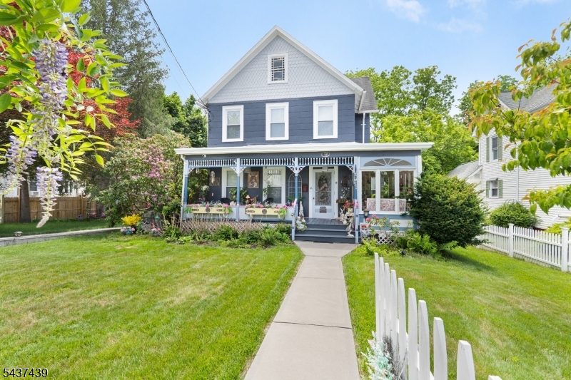 Spacious & amazing!  You will love this pristine home with charm, character and three levels of spacious living. Completely & thoughtfully renovated, this beautiful house blends fine detail with modern perfection.  Natural light highlights the stained glass windows that accent this home with gleaming wood floors and high ceilings, too.  The large, open third floor can be used as an office, secret getaway or possible fifth bedroom!  This one has all the extras - front porch, back deck, sunroom, reading nook and two fully renovated bathrooms.   A large garage with loft and basement provide plenty of storage space.  Public water, sewer and natural gas.