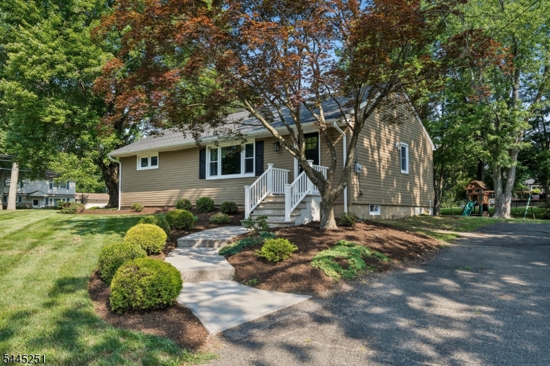 Welcome to 1 Berkshire St, a beautifully renovated ranch in the desirable Bee Meadow section of Whippany. A great alternative to townhouse living, this home is ideal for anyone downsizing, just getting started, or looking for the ease of one-floor living with the added flexibility to expand up or out in the future. This inviting home offers 2 bedrooms and 1.5 baths, including a convenient half bath in the master bedroom. The main level features hardwood floors throughout, a bright eat-in kitchen with quartz countertops, stainless steel appliances, and sliding doors that open to a spacious backyard with patio, perfect for relaxing, entertaining, or outdoor dining. The cleanly finished basement adds excellent bonus living space with two large finished rooms ideal for a gym, playroom, office, media room, or additional entertaining area, plus a generous storage room with washer/dryer hookup. Set on a beautiful, quiet street, Berkshire is ideal for walking and connects to several other peaceful neighborhood streets. Located in the highly sought-after Bee Meadow school section, this move-in ready home combines comfort, updates, and future potential!