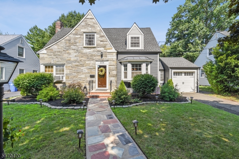 #BACKYARDGOALS. Welcome Home sweet home. This magnificent tudor nestled in the heart of the extremely sought after Sunny Side neighborhood, features a fully renovated kitchen with new stainless steel appliances and granite counter tops, sunken oversized living room with charming fireplace and built in shelving, and bright formal dining room with bay window, perfect for holiday. The mudroom off the 1 car garage is convenient storage, with room for all your shoes and coats. Upstairs you will find 3 bedrooms and a gorgeously renovated bathroom with separate tub and oversized shower. The basement is semi finished with powder room, which makes a great additional living space and den. Outside this home is an entertainers paradise, with brand new patio, gazebo, and built in fire pit. This fully fenced in yard with low maintenance vinyl fencing provides tons of privacy. New gutters, siding, and upstairs windows were installed in 2020. Magazine worthy Decor & finishes, with gleaming hardwood floors throughout. Nothing to do but unpack and throw backyard BBQ! Close to major highways, transportation, restaurants, and shopping. Do not come to the home or knock on the door without a confirmed showing.