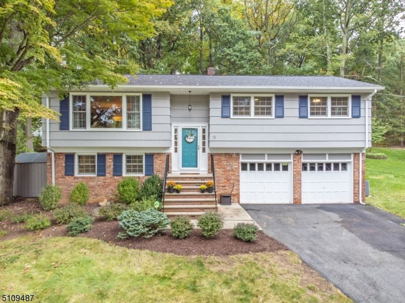 Stunning 4 bedrooms and 2 bath bilevel in Morris Township's Burnham Park section. The open floorplan, hardwood floors and ample natural light make it perfect for entertaining. The kitchen offers granite countertops, stainless steel appliances and sliding doors that lead to the deck. Stairs from the deck lead to the the paver patio (new in 2020) with built in fire pit and seating area. Upstairs are 3 bedrooms and a full bathroom. Downstairs there is another full bath with laundry, an additional bedroom and family room with sliders to the patio and spacious back yard. Home has a two-car garage, roof and windows replaced in 2015. Great location, close to town and commuter lines in a fantastic neighborhood.