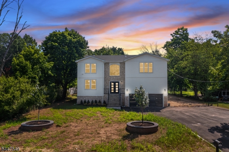 New Construction! Elegance, Innovation, and Distinction all in one Remarkable Home. Experience the pinnacle of luxury living in this custom colonial masterpiece, perfectly situated in one of Bridgewater's most sought-after neighborhoods. Offering over 3,900 square feet of impeccably designed living space, this exceptional residence features 5 spacious bedrooms, 4 luxurious full baths, and innovative smart home technologies designed for comfort, convenience, and modern living. A grand two-story foyer welcomes you into a bright, open floor plan ideal for both everyday living and elegant entertaining. The gourmet eat-in kitchen is a chef's dream, showcasing premium appliances, custom cabinetry, and seamless flow into the expansive family room. Formal living and dining areas, a private home office, and a first-floor bedroom with an en-suite bath provide the perfect balance of style and functionality. Upstairs, you'll find four additional bedrooms, including a Princess Suite and an exquisite primary retreat featuring dual walk-in closets, a spa-inspired bath, and a private balcony. A full basement and oversized two-car garage offer exceptional storage and endless possibilities. Outside, the expansive backyard provides the perfect canvas to create your own private resort-style oasis. Ideally located near top-rated schools, parks, shopping, dining, and major commuter routes, this extraordinary home delivers timeless craftsmanship, sophisticated design, and the luxury lifestyle.