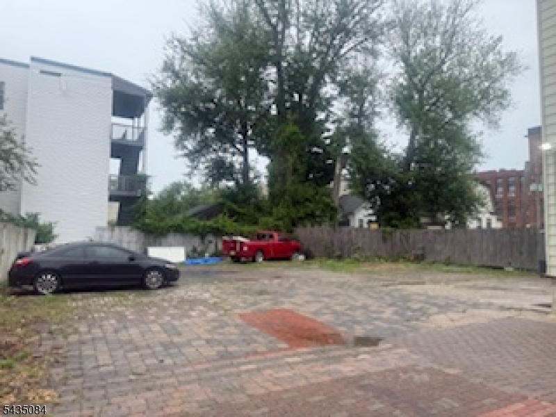 Legal 3 family home with driveway and plenty of additional parking