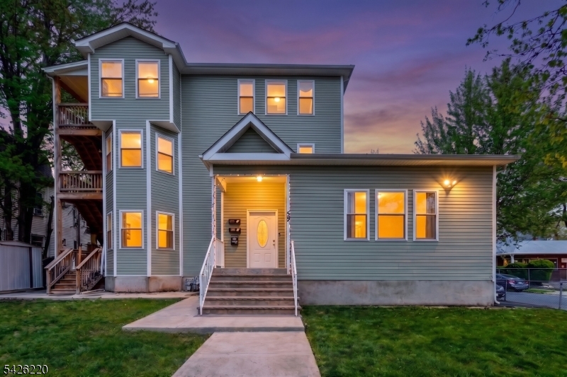 Welcome to beautiful three-family home. This turnkey property offers modern construction, strong income potential, and exceptional versatility for both investors and owner-occupants. Each unit features a spacious and well-designed layout with 3 bedrooms and 2 full bathrooms, while the first-floor unit stands out with 3 full bathrooms it's ideal for added convenience and flexibility. All units showcase updated kitchens with contemporary finishes, stainless steel appliances, and open-concept living and dining areas filled with natural light. The home has been completely upgraded with brand-new, separate heating and central air conditioning systems for each unit, ensuring efficiency and individual control. Additional highlights include modern flooring, updated bathrooms, and thoughtfully designed interiors throughout. The fully finished basement offers incredible bonus space, perfect for recreation, storage, or potential additional living flexibility. Exterior features include a large private driveway with ample off-street parking, a rare and valuable amenity for a multi-family property. The property also boasts updated siding, newer roofing, and a clean, well-maintained appearance. Whether you're looking to live in one unit while generating rental income or expand your investment portfolio, this property checks all the boxes with its strong layout, and desirable features. Don't miss this exceptional opportunity!