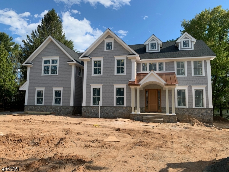 A gorgeous bluestone walkway & portico w/copper roof welcome you into this beautiful,sun filled custom home built by Calusa Building Co.This stunning home boasts 10' ceiling height on 1st fl.,4"oak floors throughtout, Bischoff CUSTOM cabinetry in kitch&baths,chef's kitchen w/Wolf,SubZero and Bosch dual dishwashers,white soft close cabinetry,&Carrera counters.Numerous amenities inc basement kitchen,outdoor kitchen,walk in pantry,wine cellar,2 gas fireplaces, 3 car grge,butlers pantry&coffered ceilings.Incredible master suite & 4 finished levels.Exceptional,expansive,flat, private yard.Don't miss this amazing home!