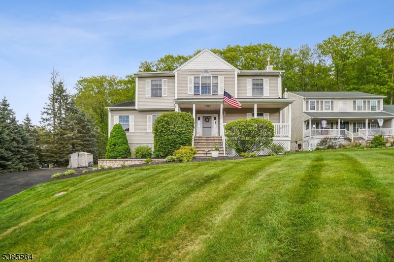Located in a prime Lake Hopatcong neighborhood, 1 Spinnaker Way offers 3 finished levels, 4 bedrooms, and 2 full plus 2 half baths. With hardwood floors, recessed lighting, and a eat-in kitchen with stainless steel appliances, this Colonial blends comfort, style and convenience near schools, shopping, recreation and highways. An additional AC unit was added to the second floor. There is a water filtration system, Pella double hung windows and patio door. This home backs to 28 acres of wooded property that is owned by the membership of the homeowners association which means that property can never be built on. The basement features a custom stereo system. The garage has an extra refrigerator and freezer, as well as a bar style refrigerator in the basement. Close to dining and year-round recreation.