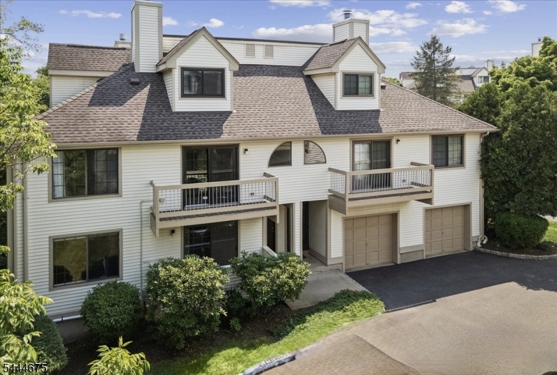 Move right into this bright and stylish end-unit condo with attached garage in sought-after The Cedars of Bernards Township. Freshly painted and beautifully maintained, this 2-bedroom, 1.5-bath home offers a warm, easy flow with engineered wood floors throughout, an elegantly remodeled kitchen, and two private decks overlooking serene wooded views. Step inside to a spacious eat-in kitchen with tasteful updates and sliders to the first deck, perfect for morning coffee or casual outdoor dining while enjoying the peaceful setting. A separate dining room opens to the sun-filled living room, where a wood-burning fireplace and sliders to a second deck create an inviting space to relax or entertain. The second bedroom is bright and versatile, currently used as a home office, with a large closet for added storage. Upstairs, the tranquil primary bedroom offers two closets and a charming sitting nook, creating a comfortable retreat at the end of the day. An attached one-car garage adds everyday convenience, while the end-unit location provides extra light and privacy. Located across from a golf course and surrounded by the easy lifestyle The Cedars is known for, residents enjoy community amenities including a pool, tennis courts, basketball courts, playground, and clubhouse. Close to shopping, dining, parks, highly regarded schools, and Routes 287, 78, and 206, this home truly checks all the boxes!