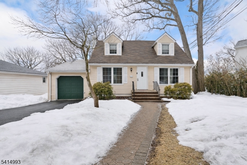 Live the Lake Hopatcong lifestyle without the lakefront price tag. Welcome to this 4-bedroom, 2.5-bath Cape Cod tucked in the heart of Landing, NJ, just minutes from marinas, waterfront dining, boating, fishing, and year-round recreation on New Jersey's largest freshwater lake.Whether you're an investor looking for strong rental potential or a first-time buyer ready to step into homeownership, this home offers space, flexibility, and value in a vibrant lake community. Inside, enjoy hardwood floors, a bright and spacious living room, and a formal dining room perfect for gatherings and everyday living. The eat-in kitchen offers great functionality and opportunity to make it your own.A main-level bedroom with full bath provides flexibility for guests, a home office, or convenient single-floor living. Downstairs, the finished walk-out basement expands your options with a family room, office/bedroom, extra storage, and potential 5th bedroom offering flexible space for guests.Step outside to a large deck overlooking a private backyard, perfect for relaxing after a day on the lake. Additional features include a 1-car garage, driveways, and generous storage space beneath the first-floor den/bedroom.Located in a friendly neighborhood within a top-rated school district, with easy access to Route 80, Route 46, and NJ Transit, this property combines lifestyle, convenience, and long-term value. Opportunity like doesn't last come see the potential for yourself.
