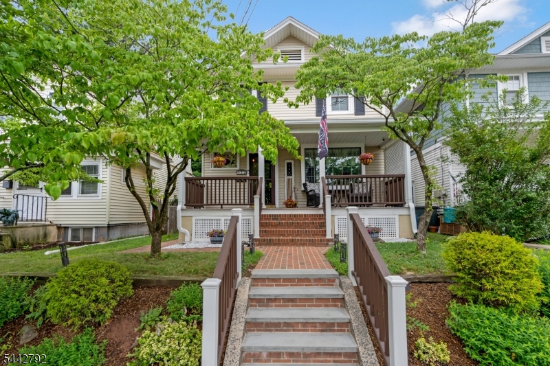 Welcome home to this incredibly charming Somerville gem, where timeless character and modern updates come together perfectly. From the moment you arrive, the curb appeal captivates with a welcoming rocking chair front porch. Step inside and be greeted by stunning hardwood floors showcasing the craftsmanship and quality of a bygone era. The spacious living room features an oversized bay window that fills the home with natural light, along with beautiful wainscoting millwork that adds warmth and elegance. The living room flows seamlessly into a grand dining room highlighted by a striking beamed ceiling perfect for entertaining. Just beyond, a delightful sunroom offers additional living space and features French doors leading to the deck, creating an ideal indoor-outdoor connection. The updated kitchen boasts granite countertops, a custom tile backsplash, abundant cabinetry, and convenient access to the deck for easy outdoor gatherings. Upstairs, you'll find 3 generously sized bedrooms, multiple closets, and a full bath. The unfinished basement provides a laundry area and ample storage space. Outside, the backyard is truly your own private oasis. Enjoy custom brickwork pathways, a fenced yard, a tranquil waterfall pond, and a storage shed, all surrounded by beautifully landscaped grounds. Adding to the home's appeal is its proximity to vibrant downtown Somerville, known for its award-winning restaurants, unique shops, caf s, NJ Transit and more!
