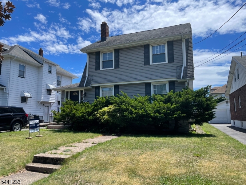 LARGE 1 FAMILY HOME FEATURING 3 BEDROOMS,1.5 BATHS, LIVING ROOM WITH FIREPLACE ,DINING ROOM, PARTIALLY FINISHED BASEMENT.GREAT LOCATION- CLOSE TO TRAIN STATION AND TRANSPORTATION TO NYC .HOUSE WILL BE SOLD AS IS