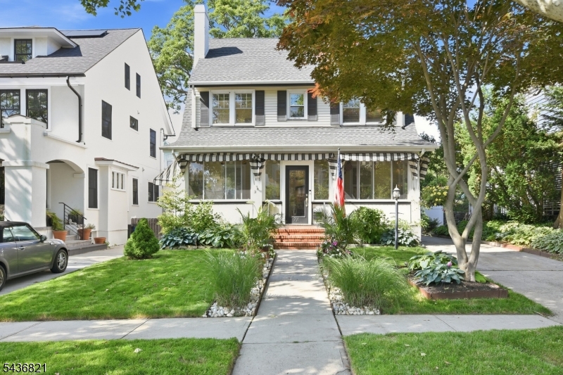 Wonderful 2nd home, Vacation or Primary Home located in vibrant Asbury Park, named Travel + Leisure's ''Best Small Beach Town in the U.S.'' for 2025, Rare opportunity for this beautiful updated home which blends historic charm and modern living. Situated on a quiet, tree-lined street just blocks from the Allenhurst Station, one block from Deal Lake, and a few blocks from the North End beaches. Offering 5 bedrooms (or 4 plus a large office), the home features a wood-burning fireplace, hardwood floors, original chestnut moldings, a grand staircase, and beamed ceilings. Entertaining in the gourmet kitchen with quartz countertops then opens to a spacious Trex deck and beautiful fenced in backyard. Additional highlights include 2.5 baths, lake views from the expanded primary suite, formal dining room, family room, wonderful enclosed porch and basement.