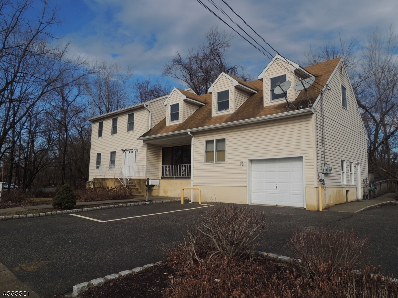 Great 1st floor comm/prof office available in a busy location close to all major highways!!! Newer building with all large rooms and big windows letting plenty of light in, bright and light! It features: a reception area, four offices, ,a  kitchenette, a bath, a copier space.  ADA Compliant Ramp and five parking spaces are there for tenant's needs.Hurry up!!