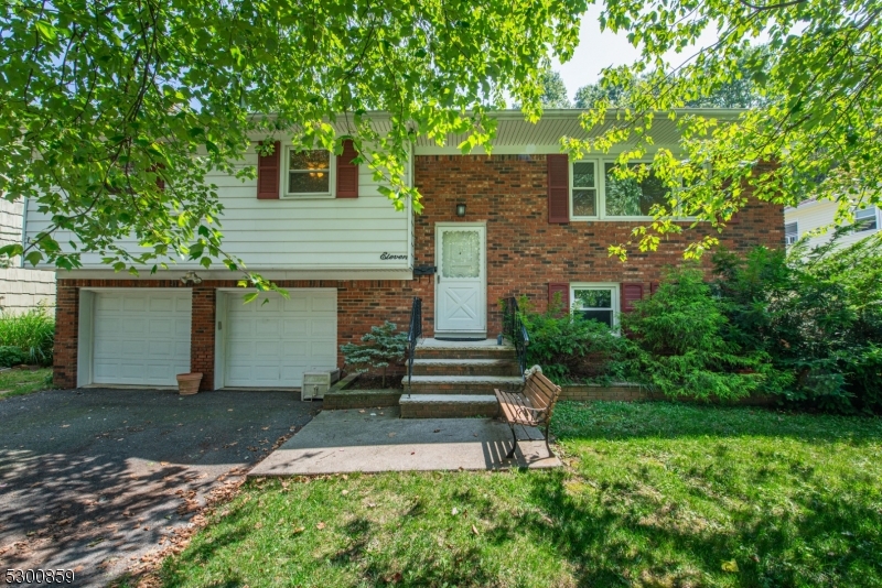 Bring your contractor, this 3 bed/2bath Bi-Level is ready for your personal touch. A commuters dream; close to multiple highways, Golf Course, shopping, restaurants and more. Located on a quiet side street in the Upper Lake Hiawatha area with no neighbors behind! The upper level has hardwood floors under the carpet and consists of dining room, living room, 3 large bedrooms, the main bathroom, and eat in kitchen. Sliders that go out to a large deck from the kitchen and dining room. Lower level has a full bathroom, laundry room, garage entrance, and family room with fireplace and sliders to the backyard. New Roth oil tank installed in 2023, gas in the street.