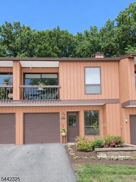 Move in Ready Multi Level Townhome in Desirable Overlook Village. 2 Bedroom, 1.5 Bath with 2nd Floor Laundry. Open Kitchen and Dining room with Custom Pantry.Living Room has Cathedral Ceiling with Large Sliding Door Leading to Beautiful Paver Patio, and Peaceful Yard Ready for Grilling. Location is Unbeatable: Just 2 minutes from Costco, ShopRite, and Major Highways.