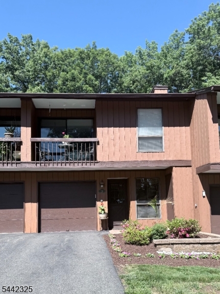 Move in Ready Multi Level Townhome in Desirable Overlook Village. 2 Bedroom, 1.5 Bath with 2nd Floor Laundry. Open Kitchen and Dining room with Custom Pantry.Living Room has Cathedral Ceiling with Large Sliding Door Leading to Beautiful Paver Patio, and Peaceful Yard Ready for Grilling. Location is Unbeatable: Just 2 minutes from Costco, ShopRite, and Major Highways.