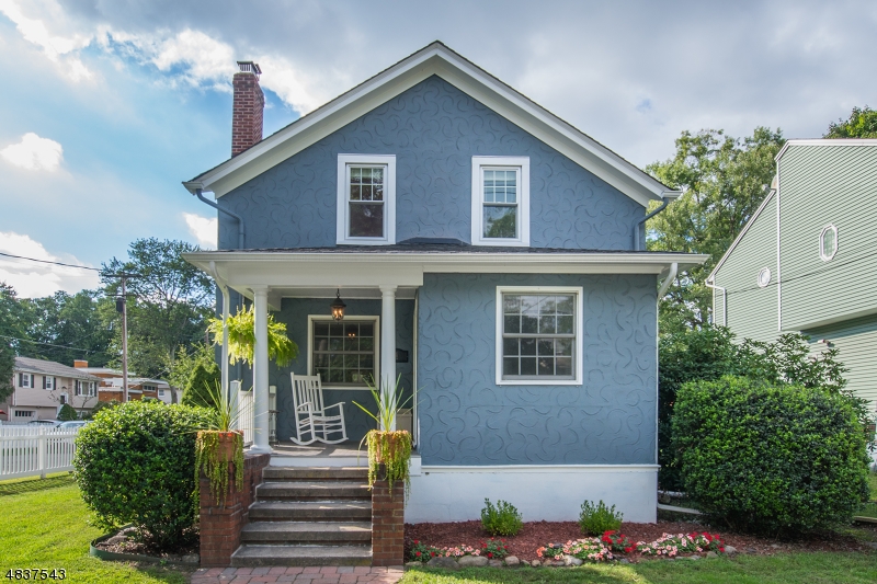 Charming Side Hall Colonial on Corner Lot. Stunning Open Porch w/Columns & White Picket Fence. Col.Blue exterior adds vintage flair: classic &refined.LR w /WB Fireplace & Built-Ins. Great Formal DR w/ Wainscoting & Window Seat. HW Floors, Archways &Crown Molding Throughout. Updated Galley Kitchen Features Tons of Countertop Space & SS Appliances. Bright Bfast Area w/Large Window Overlooks Brick Paver Patio. Bsmt Bonus offers more living + laundry & storage. 2nd Floor provides 4 generous bdrms & updated bath. Large yard Perfect for Entertaining & Relaxation! Enjoy all the community has to offer! Just 2Blocks from Denville?s Bustling Downtown. Tons of Parking+2 Car Detached Garage. Sidewalks-Walk to Broadway Ave & NYC-Direct Bus Stops. Enjoy Denville's Shopping, Restaurants, Farmers Market &Top-Rated Schools.