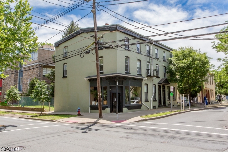 Prime Investment Opportunity in the Heart of Lambertville.  Incredible Lambertville Investor Opportunity. This rarely available mixed-use property offers 8 income-generating units, ideally located in the vibrant center of Lambertville and outside the flood zone.The building features 7 well-maintained residential apartments including a blend of 1- and 2-bedroom units plus 1 high-visibility commercial space with an excellent rental history. Updates to the units include modern kitchens, flooring, windows, and all units are fully air-conditioned for year-round comfort.Tenants enjoy outstanding amenities including a shared rooftop deck and a spacious, fenced backyard. The exterior has been freshly repainted, enhancing curb appeal and long-term durability. The property provides future owners a combination of immediate appeal and consistency as well as potential paths to increase value. With its unbeatable location steps from Lambertville's renowned restaurants, galleries, shops, and the scenic canal path for biking, fishing, and outdoor recreation, this property offers a rare combination of strong cash flow potential and lasting tenant appeal.
