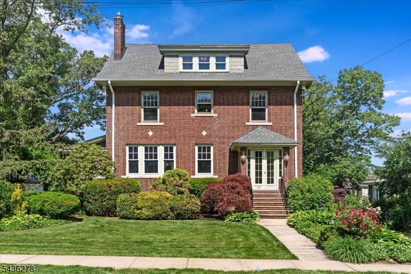 Welcome to this stunning 5 bedroom Colonial Revival that offers the perfect blend of original architectural details with modern comfort. 53 Bowdoin sits on a quarter of an acre, showcasing high ceilings, ornate moldings, elegant millwork, chestnut wainscoting and newly refinished oak hardwood floors. It also has modern amenities we've come to love such as an updated kitchen with custom cabinetry and stainless steel appliances, newly renovated bathrooms, new central air conditioning systems, a gas fireplace, a brand new roof, 200 amp electric, and new windows throughout. There are so many incredible areas to entertain guests such as the oversized living room, sun drenched maplewood room, elegant formal dining room with coffered ceilings, spacious center-island kitchen and expansive deck and yard. From the grand foyer, head up the impressive staircase to the 2nd floor where you will find a significant landing leading to 4 bedrooms and an updated hall bathroom. Continue to the 3rd floor to find the primary suite featuring a renovated bathroom and large flex room which would make for the perfect study, gym, or game room. The large basement lets in tons of natural light and presents endless opportunities for additional living space. This property also has ample parking with a 3 car garage and an additional 1 car garage! This home is incredibly located, you can walk to the train, Maplewood village, schools, playgrounds and more.