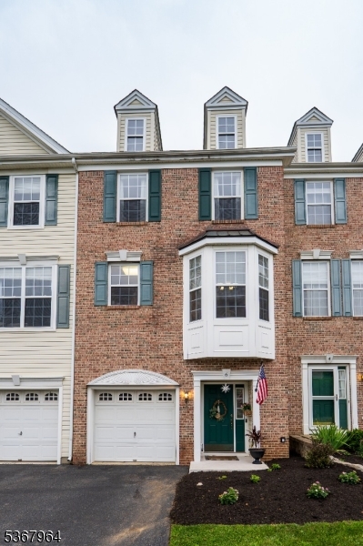 Located in the highly desirable Warren Heights community, this stylish, move-in ready townhome offers the perfect blend of comfort, modern design, and convenience. Filled with natural light, the thoughtfully designed layout features luxury vinyl plank flooring, tasteful finishes, and inviting living spaces throughout. The entry level welcomes you with a spacious foyer, cozy family room with a gas fireplace, half bath, attached 1-car garage, and sliding doors leading to a fenced backyard with a beautiful stone patio ideal for relaxing or entertaining. The open-concept main level is perfect for today's lifestyle, seamlessly connecting the living room, dining area, breakfast nook, and beautifully updated kitchen featuring granite countertops, stainless steel appliances, a pantry, and a striking basketweave tile backsplash. A convenient half bath completes this level. Upstairs, you'll find a laundry area, a generously sized secondary bedroom with double closets and access to a full bath, and a spacious primary suite with a walk-in closet and private en suite bath. Economical gas heat, stylish d cor, and a prime location with convenient access to Routes 22, 78, 31, and 33, as well as shopping and dining, make this home an exceptional opportunity. Enjoy resort-style amenities including two fitness centers, a swimming pool, dog parks, a basketball court, and a clubhouse all included in the HOA.