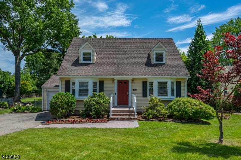 This picture-perfect 3 bedroom/3 full bath updated Whippany Cape must be seen in person! It is so much larger than it appears from the street and it is just a delightful home! The light flowing into the kitchen, dining, and living room areas from an abundance of windows and skylights is wonderful. The beautiful deck off those rooms overlooks a gorgeous, large, park-like backyard. A true highlight of this home, the backyard is exceptionally deep, level, and features beautiful, professional-grade landscaping. Plus, there is a motorized awning over the deck. Enter the home through the functional foyer and find rich hardwood floors, a first-floor bedroom, a full bath, spacious open rooms featuring a very large living room, a huge eat-in country kitchen, and a sunken dining room with sliders to the deck. Head upstairs to find 2 additional bedrooms and a full bath. On the lower level, there is a terrific rec room, a room that can be used as a small office or a pantry, a laundry room, another full bath, and additional storage in the hallway to the door to the backyard. This home has been meticulously maintained inside and out and is a pleasure to bring to the market. Here is your chance to move right into an outstanding home in Hanover Township. Hanover is known for its good schools, low taxes, exceptional municipal services, proximity to shopping, restaurants, recreation, major highways, and NYC transportation including Mid-town Direct train stations.