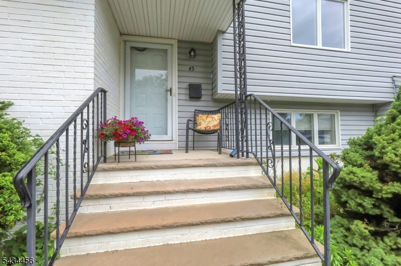 Best location quiet street in Radburn school area. Natural light with large windows,3 bedrooms 2.5 bath split level with extended Eat-in Kitchen and extended basement. Entry foyer, living room open to dining room and large kitchen with island, eat-in  skylights and sliding door  to deck overlooking a private back yard. Second floor has 2 bedrooms updated bathroom and master bedroom with master bath. The ground level-family room with new floor, powder room, laundry garage entry and sliding doors to patio. Basement is extended have recreation room and room for gusts to stay over. NYC transportation, park and houses of worship.
