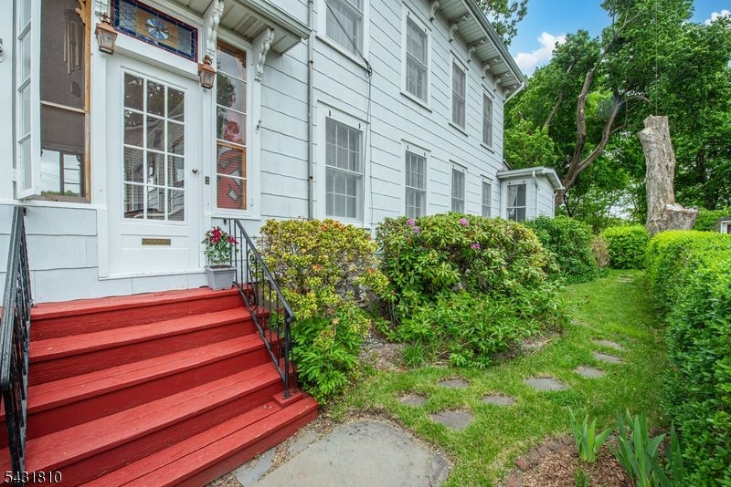 The fourth owners in 170 years proudly present this home in Stanhope! Situated on the historic Morris Canal Slip, this Victorian-Era Colonial has been meticulously maintained, and still bears many of its original features. It has been thoughtfully updated while maintaining the stately charm it was built with in 1855. The first floor has a living room with original wood floors with diamond-pattern inlay and original window mouldings. The formal dining room is a generous size and offers plenty of space for entertaining. Standout features are the original built-in china cupboard, and fireplace that is currently decorative and not in use. The kitchen has a custom-made pantry, and faces the expansive backyard towards the historic Morris Canal Slip. On the second level are two bedrooms and the main bath, and another flex-room that can be utilized to best fit your needs! Make it an office, a walk-in closet, or a reading nook. Finally, the third level houses two more bedrooms! This is a very special home! Don't miss it!