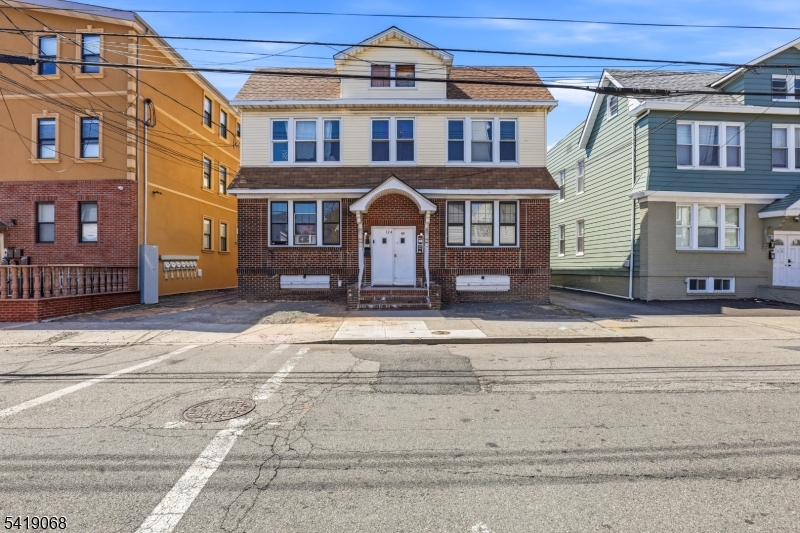 A Must see FOURPLEX UNITS Investor dream TURN- KEY income producing property with lots of upside , 4 residential apartments with exceptional possibilities within 6  minutes from Hillside Nj. This turnkey property with 9 Bedrooms, 4 Baths and separate utilities is fully leased Huge and well-maintained 4-unit side-by-side duplex featuring a classic, symmetrical facade with brick on the first level and durable siding above. A wide driveway with  a two car garage,   The property offers two stories with a balanced layout, strong curb appeal, and consistent rental demand. Each unit benefits from abundant natural light through multiple windows and practical, The building includes four income-producing units with an established rent roll, making it an attractive option for investors seeking stable cash flow or an owner-occupant looking to offset expenses. A central front entrance with brick steps enhances the property's presence, convenience. Situated on a residential block close to transportation, shopping, and neighborhood amenities. Solid long-term investment with dependable income and future upside potential. Don't miss out on this rare opportunity!