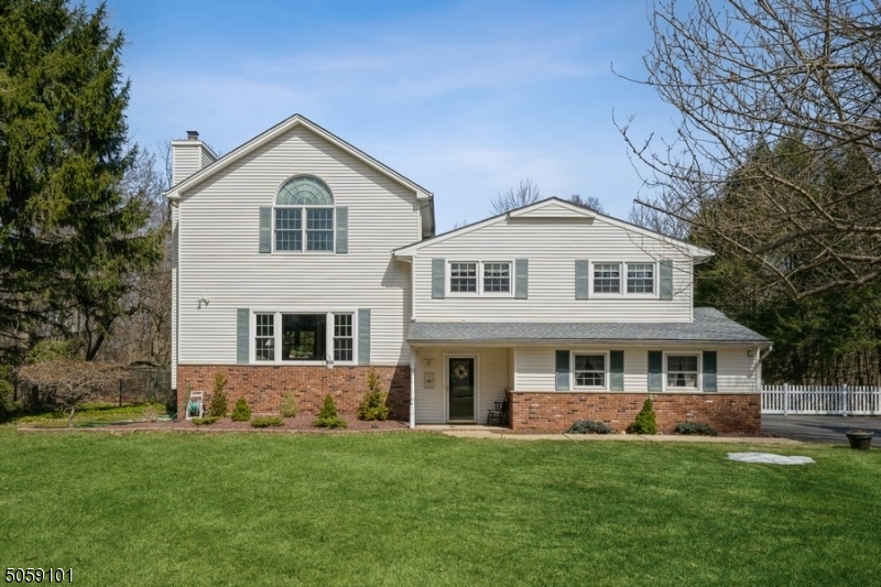 Beautiful, private Custom Split-Level w/4 BRS, 2.5 BAs. Tranquility w/ scenic woodland views of protected open land. Located w/in a mi. from schools, mins. to Roxbury Mall, NJ Transit train & Rtes 10, 46 & 80. The generously proportioned home feats HW Fls & lots of natural light. Country-chic touches lend a warm, welcoming ambiance.A lrg foyer opens to a rustic Fam Rm w/ wood-beamed ceiling, wet bar, natural wood paneling, FP & sliders lead to lrg screened-in porch overlooking a sweeping back lawn & woods. Pwdr rm & 2-car gar complete Gr Fl. 1st fl inc sunlit LR w/ FP, DR, spacious kitchen w/ss apps, ample cabinets&granite counters. 2nd fl has 3 lrg BRs & full BA, 3rd fl feat dreamy MBR w/vaulted ceiling, round top window, 2 WICs, lrg MBR BA w/double-sink.Finished basemt inc rec rm, laundry rm&tons of storage.
