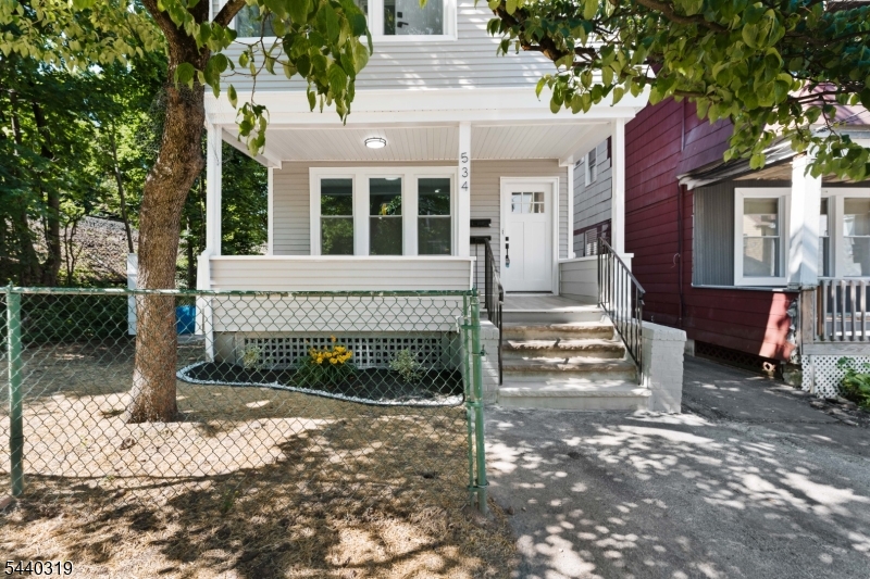 Location, Location, Location: Modernized two family gutted to the studs and has new roof, siding, windows, electric, plumbing, floors and sheetrock. Unit one features two bedrooms, updated full bath, porch, dining room, living room and matched stainless appliances complement the quartz counters in updated kitchen. Unit two features three bedrooms, updated full bath, living room, porch and matched stainless appliances complement the granite counters in updated kitchen. Finished basement features laundry area and larger area for entertainment. Near train station, public transportation, shopping center and major highways.