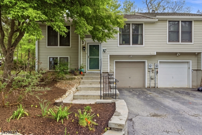 Welcome to this beautifully maintained 3-bedroom, 3-bath townhouse in the highly desirable Walden Village community in Hardyston. Offering generous living space across multiple levels, this home combines comfort, functionality, and modern updates with a warm, inviting feel. Step upstairs into the bright open-concept main living area, where the spacious living room flows seamlessly into the formal dining area, making entertaining effortless. The large kitchen features a gas stove, center island, and sliders leading to a private deck perfect for morning coffee or unwinding outdoors. The main level also includes a spacious primary suite with double closets and a full bath, along with a second bedroom and additional full bathroom. The fully finished lower level adds even more flexible living space with a welcoming family room centered around a gas fireplace. Sliders open to a private patio, extending your living space outdoors. This level also includes a third bedroom, full bath, laundry/utility room, and abundant storage space with direct access to the 1-car garage.Residents of Walden Village enjoy community amenities including a pool and playgrounds, all conveniently located near shopping, the YMCA, Routes 23 & 94, and just about an hour from NYC. Outdoor enthusiasts will love being close to Mountain Creek Resort, Crystal Springs Resort, hiking trails, golf, skiing, and everything beautiful Sussex County has to offer.