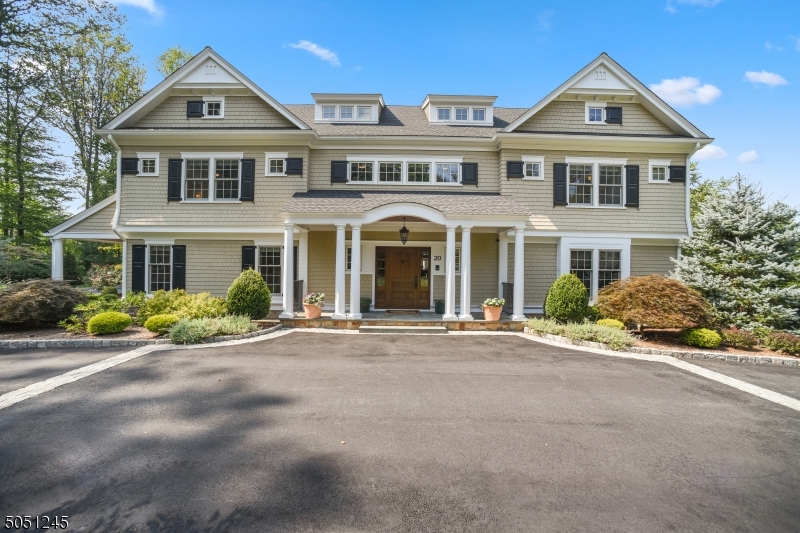 Nestled in one of Morris Township's most esteemed streets & perfectly perched on over 2 acres of lush grounds,this 2014 custom built home feat 5 bed & 5.2 baths across 3 flrs of lavish living.The main liv spaces are found on the 1st flr where you'll find impeccable finishes & an open-plan layout.No detail has been overlooked!As you step inside you are greeted by a welcoming foyer,flanked by a formal DR & Library.A chef's kit w/sun-lit brkfst rm,a fam rm w/frpl,2 powder rms,a mud rm and study complete this level.Housed on the 2nd flr are 4 bdrms,laundry & fam rm.The lavish master is warmed by a frpl & includes 2 grand dressing rms & a spa-like bath. Backyard feat mature trees,patios w/built-in outdoor kit & BBQ,in-ground pool &outdoor firepl,pool house w/bath.Fin LL & Professional Golf Simulator on upper L.