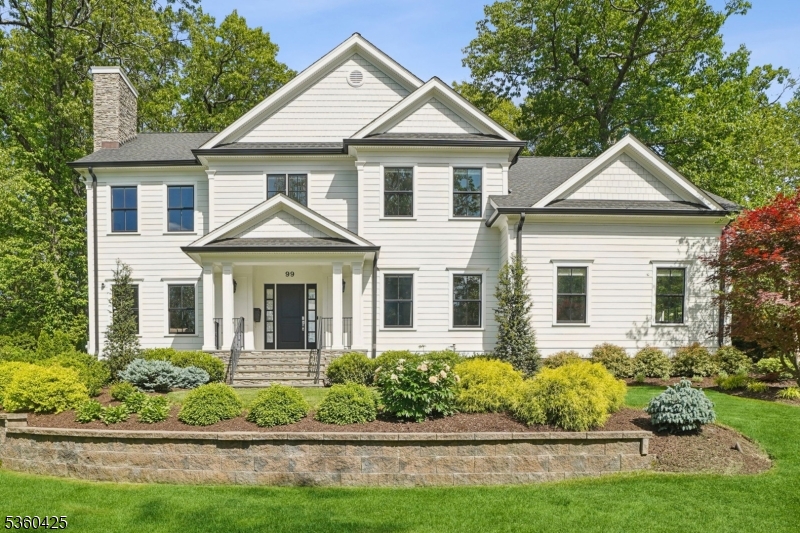 Welcome to this stunning newer constructed Colonial, situated on Summit's Northside, offering the perfect balance of timeless elegance & modern sophistication. Thoughtfully enhanced by the current owners w/a host of high-end upgrades, this 6-bedroom, 6.1-bath home exudes luxury living, style, & functionality. As you enter the grand two-story foyer, you're met w/quality craftsmanship, refined millwork, & high ceilings throughout. The formal living room, w/gas fireplace, & the elegant dining room w/adjoining butler's pantry provide ideal spaces for entertaining. The heart of the home is the expansive open-concept family room & gourmet chef's kitchen featuring an oversized quartz island, custom cabinetry, & top-tier appliances. A versatile first-floor bedroom suite, perfect as a guest room or office, along with a spacious mudroom & convenient garage access complete the main level. Upstairs, the luxurious primary suite boasts a beautiful balcony, dual walk-in closets, & a spa-like bath w/radiant heat floors, soaking tub, oversized shower, & double vanities. Three additional ensuite bedrooms, 2 w/tray ceilings, & a well-appointed laundry room provide comfort & convenience. The expansive lower level offers flexibility w/a recreation room, gym, 6th bedroom, & full bath. Outdoors find exquisite landscaping complemented by custom lighting. The private grounds include a paver patio & level yard, perfect for outdoor dining & relaxation. All just minutes from Summit's vibrant downtown!