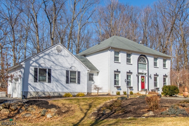 Find this Fabulous Colonial on a flat,wooded lot in a very desirable, quiet neighborhood, updated,freshly painted & ready to go! Enter the 2-story foyer to find custom trim,molding & HW on 1st floor. A Spacious kitchen includes Granite, SS, NEW microwave & DW, abundant cabinets, center island & workstation/pantry. Move the crowd through sliders outside to the freshly painted deck or entertain guests inside in the sizable Family Rm that includes a gas Fireplace, and flows to the Living Rm.  Upstairs, the Master BR has a tray ceiling, large WIC & generous ensuite bathroom. 3 additional bedrooms provide space for all. Newer HW heater and furnace. Beautifully finished basement has GREAT storage space. Natural gas, CAC, convenient to schools, shopping & highways. Property borders wooded Township lot.