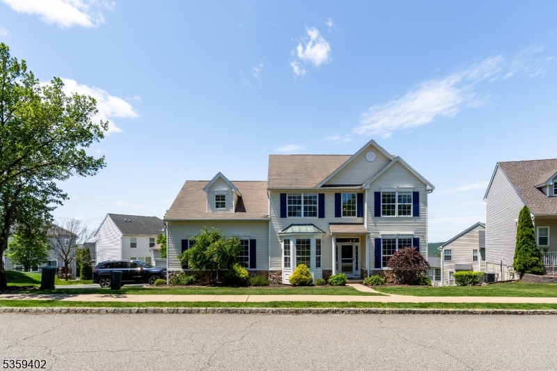 Welcome to this beautifully maintained home offering the perfect blend of comfort, space, and functionality. This 4-bedroom, 2.5-bath residence is set in a quiet, sought-after neighborhood. The kitchen offers a clean, classic style with plenty of cabinetry, counter space, and an abundance of natural light ideal for everyday living and casual gatherings. The main level includes spacious living and dining areas with large windows and a home office with hardwood floors. Upstairs, you'll find four generously sized bedrooms, including a primary suite w/a private bath and ample closet space. A standout feature of this home is the fully finished walkout basement, providing versatile space for a recreation room, gym, or play area.  The walk-out basement offers exit to the stone pavers patio w/ firepit.  Woodfield Estates offers community amenities, including a swimming pool, playgrounds, a ball field, a basketball court and a multi-use sports court. Conveniently located near top-rated schools, parks, shopping, and major highways. Don't miss your opportunity to make this well-kept and move-in-ready home your own.