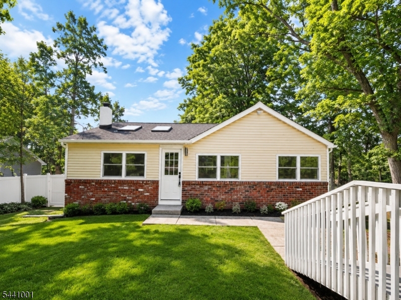 Welcome to desirable Upper Greenwood Lake, where this beautifully renovated 3-bedroom, 1-bath ranch offers the perfect blend of comfort, style, and easy one-floor living. Step inside to a bright and inviting living room filled with natural light, featuring soaring ceilings and stunning skylights that create an open and airy atmosphere. The spacious eat-in kitchen provides the perfect place to gather with family and friends, while the private deck off the primary bedroom offers a peaceful spot to enjoy your morning coffee or unwind at the end of the day. Major improvements include a brand-new 2-bedroom septic system currently being installed, providing added peace of mind for years to come. Located in this highly sought-after community, this move-in-ready home is the perfect opportunity to enjoy lake-area living surrounded by nature, recreation, and year-round outdoor activities.