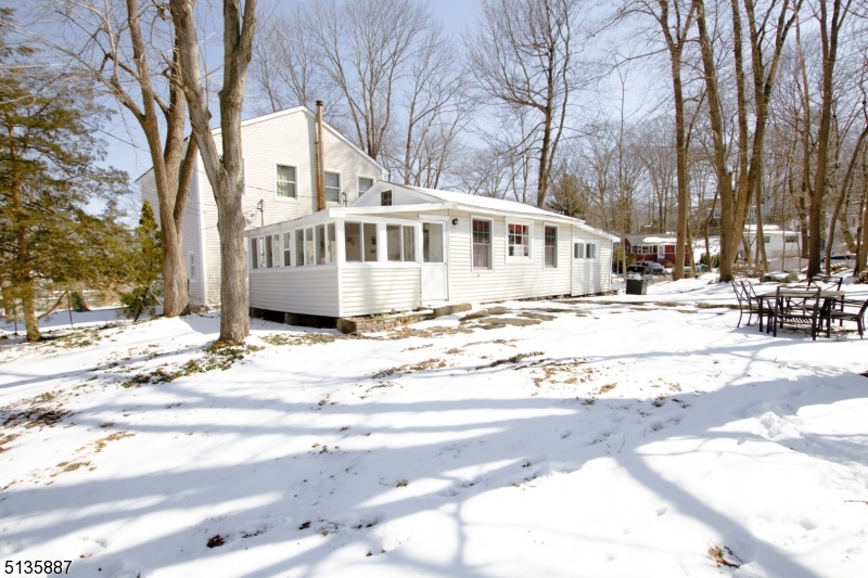 Bring your handyman today!  Great potential with lake views.  No heat, 3 season home. Sold as is. Furniture can stay if wanted.  Buyer is responsible for all town cert.   ON MONDAY MARCH 21 YOUR HIGHEST AND BEST OFFER BEFORE FIVE.       (  OFFER ACCEPTED )