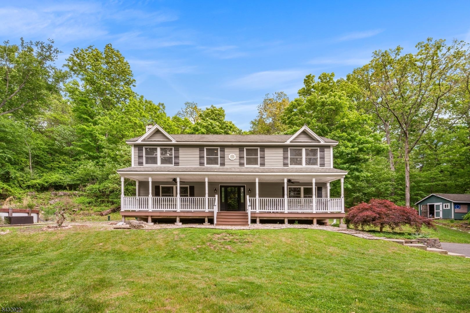 Welcome to your private retreat on 3 picturesque acres with sweeping 180-degree seasonal mountain views and the perfect blend of comfort, space, and everyday luxury. This beautifully maintained 3-bedroom home invites you in with gleaming hardwood floors throughout, setting the tone for warmth and elegance. At the heart of the home, the expansive kitchen is designed to impress, featuring a large center island, abundant cabinetry, and effortless flow into a sun-drenched sunroom, the perfect spot to start your day. Upstairs, the generously sized primary suite offers two walk-in closets. The en-suite bath is a true retreat, complete with a jetted soaking tub and separate shower. Two additional bedrooms share a full bath, while a thoughtfully designed second floor laundry room with a utility sink and storage adds everyday convenience. The walk-out lower level expands your living space with incredible versatility, featuring a wet bar, third full bathroom, and dedicated storage area. Step outside and enjoy your own backyard oasis with an above-ground pool, fire pit, and full-length front porch perfect for relaxing and taking in the beauty of your surroundings. Recent updates include new wood floors on the second floor, a new well pump installed in March 2026, and a new radon mitigation system installed in August 2025. The home is also whole-house generator ready for added peace of mind. This exceptional property offers the perfect blend of privacy, functionality, and lifestyle!